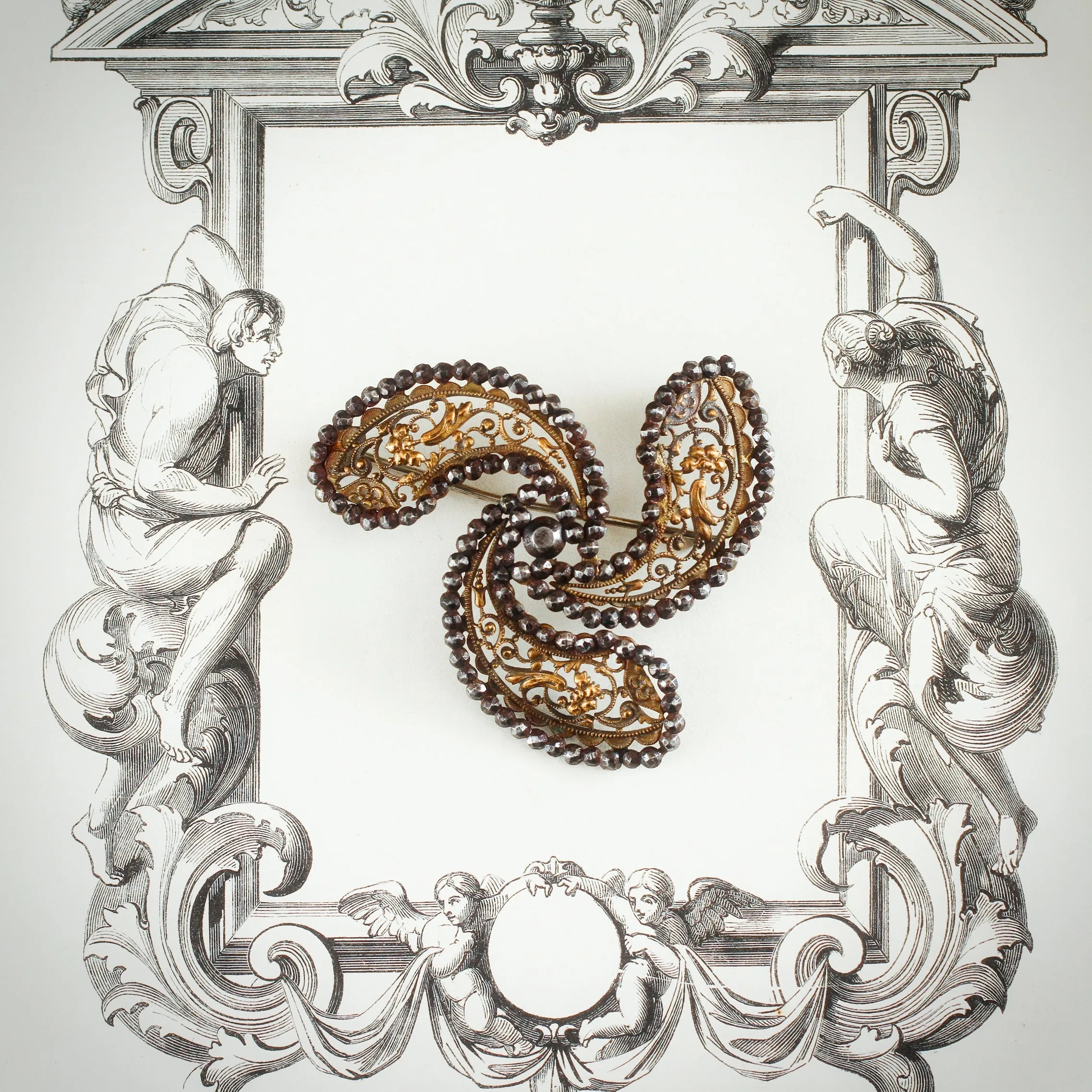 A Fanciful Antique Early Victorian Cut Steel Brooch