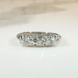 Four Sparkling Diamonds in Curvy White Gold Band